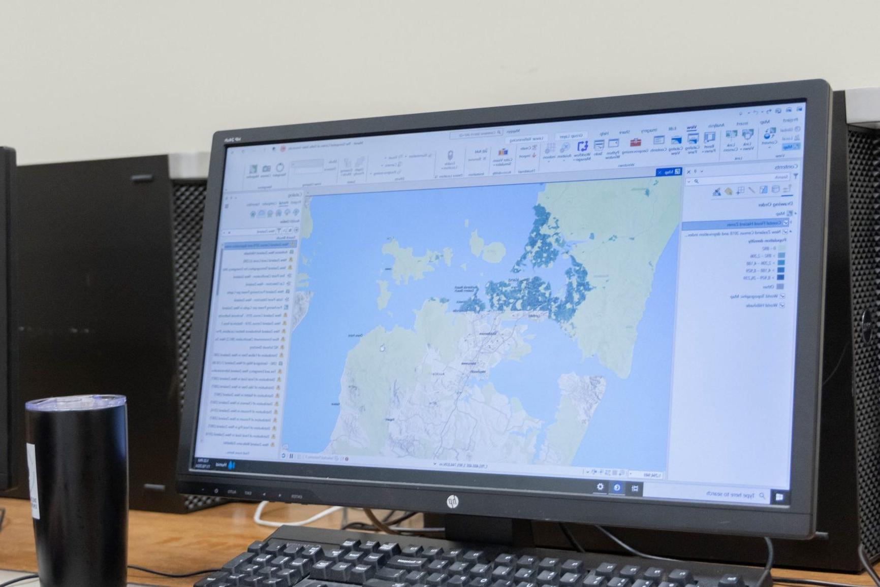 A computer screening showing geographic data analysis in ArcGIS software.